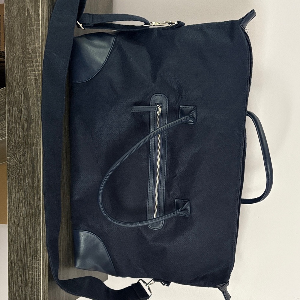 Stylish navy blue weekender bag